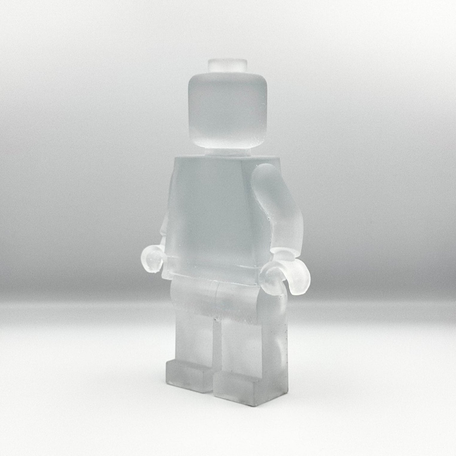 lego man sculpture in clear frosted finish