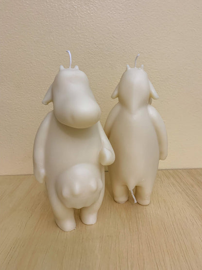 two cow shaped candle